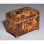 A REGENCY TORTOISESHELL TEA CADDY, C1820 with wire stringing, divided interior with the original