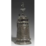 IRISH INTEREST. A WMF PATINATED METAL TANKARD, DATED 1893 cast with allegorical figures and