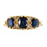 A SAPPHIRE & DIAMOND 18CT GOLD RING. MAKERS MARK H. LTD, LONDON 1980, 4.7G, SIZE M ++GOOD CONDITION