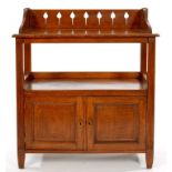 AN ARTS AND CRAFTS OAK DUMB WAITER, C1910, WITH PIERCED GALLERY, THE LOWER PART ENCLOSED BY PANELLED