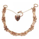 A 9CT GOLD GATE BRACELET WITH HEART SHAPED PADLOCK, 11.55G ++GOOD CONDITION