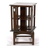 AN ARTS AND CRAFTS GLASGOW STYLE STAINED OAK ROTATING BOOKCASE, C1905, ON SQUARE BASE, 90CM H, 50