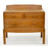 A BRYNMAWR OAK DRESSING CHEST, C1920 THE DRAWERS WITH PEGGED KNOBS, 85CM H; 46 X 94CM ++