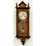 A MINIATURE WALNUT 'VIENNA' CLOCK WITH EBONISED MOULDINGS AND TRIANGULAR PEDIMENT, 57CM H, C1900