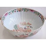 A CHINESE FLUTED FAMILLE ROSE BOWL, 23CM D, 18TH C, INDISTINCT OLD HANDWRITTEN PAPER LABELS, ONE