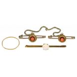 AN OPAL SET BROOCH IN GOLD, MARKED 9CT, 1.7G, A CORAL SET BROOCH IN GOLD, UNMARKED, 4G, AND A GOLD