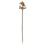 A STICK PIN WITH EAGLE HEAD TERMINAL IN GOLD, UNMARKED, 90 MM L, 4.9G