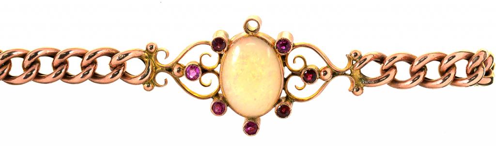 AN OPAL AND RUBY SET BRACELET IN GOLD, MARKED 9CT, 8.6G