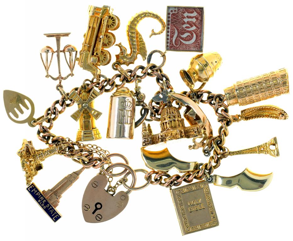 A GOLD CHARM BRACELET, TWO CHARMS MARKED 14CT, 44G