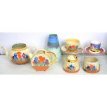 CLARICE CLIFF. A GROUP OF A. J. WILKINSON LTD CROCUS PATTERN TEAWARE, COMPRISING TWO TEAPOTS, CUP