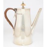 A GEORGE V SILVER BACHELOR'S COFFEE POT OF PLAIN CAN SHAPE, WITH WICKER WRAPPED HANDLE, 15CM H,