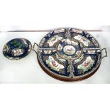 A BOOTHS EARTHENWARE 'WORCESTER' SCALE BLUE GROUND HORS D'OEUVRES SET, DECORATED WITH 'FANCY' BIRDS,