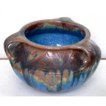 A DENBY THREE HANDLED STONEWARE JARDINIERE, IN TRAILED GLAZES OVER BLUE, 16CM H, PRINTED DANESBY