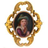 A GOLD BROOCH, SET WITH A PORCELAIN MINIATURE OF THE HEAD OF A BOY, UNMARKED, 29G++GOOD CONDITION