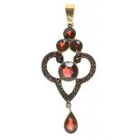 A GARNET SET PENDANT IN GOLD, UNMARKED, 50 X 22MM, 3.65G++GOOD CONDITION
