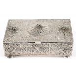 AN EGYPTIAN SILVER FILIGREE CASKET, ON FOUR DOMED FEET, 15.5CM W, THE UNDERSIDE ENGRAVED WITH