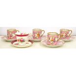 A SET OF FOUR CONTINENTAL PORCELAIN PINK GROUND COFFEE CANS AND SAUCERS, PAINTED WITH FLOWERS,