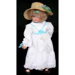 A GERMAN BISQUE HEADED CHARACTER DOLL, THE SCHOENAU AND HOFFMEISTER HEAD WITH BLUE GLASS SLEEPING