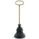 A VICTORIAN BLACK PAINTED CAST IRON DOORSTOP BY ARCHIBALD KENRICK & SON, WITH TWISTED BRASS LOOP