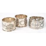 A PAIR OF CHINESE EXPORT SILVER NAPKIN RINGS, APPLIED WITH FOLIAGE, BY CSS'HAI, ALSO MARKED IN