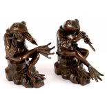 A PAIR OF SOUTH EAST ASIAN ANTHROPOMORPHIC BRONZE SCULPTURES OF TOAD MUSICIANS, 28CM H