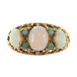 AN OPAL THREE STONE RING IN GOLD, RUBBED MARKS, 4.5G, SIZE O++GOOD CONDITION - RUBBED MARKS,