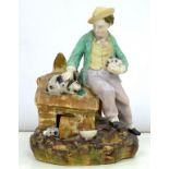 A STAFFORDSHIRE PAINTED PARIAN WARE FIGURE OF A BOY WITH PET RABBITS, 20CM H, C1860