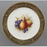 A ROYAL WORCESTER PLATE, 1921 painted by R Sebright, signed, with fruit in jewelled gilt border,