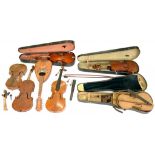 SIX VARIOUS VIOLINS AND A MANDOLIN, THREE VIOLIN CASES, ETC