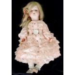 A GERMAN BISQUE HEADED CHARACTER DOLL, THE ERNST HEUBACH HEAD WITH HAZEL GLASS SLEEPING EYES, OPEN