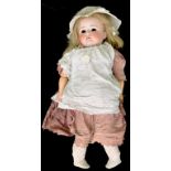 A GERMAN BISQUE HEADED BEBE ELITE DOLL, THE MAX HANDWERCK HEAD WITH (DETACHED) GLASS EYES AND OPEN