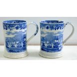 A PAIR OF BLUE PRINTED EARTHENWARE MARINE PATTERN CYLINDRICAL MUGS, POSSIBLY J AND M P BELL AND