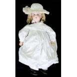 A GERMAN BISQUE HEADED CHARACTER DOLL, THE SIMON AND HALBIG HEAD WITH GLASS EYES AND OPEN MOUTH,