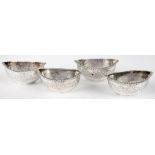 A SET OF FOUR VICTORIAN SILVER NAVETTE SHAPE SALT CELLARS, ENGRAVED WITH SWAGS, 6.5CM W,
