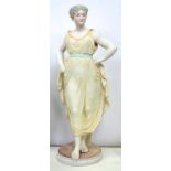 A CONTINENTAL PAINTED BISCUIT FIGURE OF A BAREFOOT YOUNG WOMAN, IN CLASSICAL STYLE, 56CM H, C1870