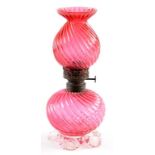 A VICTORIAN CRANBERRY GLASS OIL LAMP AND SHADE, OF UNUSUALLY SMALL SIZE AND GLOBULAR FORM,