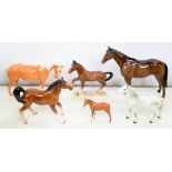 FOUR BESWICK HORSES AND A FOAL, VARIOUS SIZES, PRINTED MARK AND A CONTINENTAL EARTHENWARE HORSE