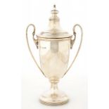A GEORGE V TWO HANDLED SILVER TROPHY CUP AND COVER OF SHIELD SHAPE, 18CM H, BIRMINGHAM 1927, 5OZS