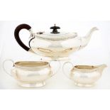 AN EDWARD VIII THREE PIECE SILVER TEA SERVICE OF OVAL SHAPE, TEAPOT 9CM H, BIRMINGHAM 1936, THE