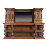 AN IMPOSING CARVED OAK SIDEBOARD, C1880, the breakfront superstructure with mirror back and pair