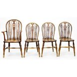 A SET OF FOUR ASH WHEEL BACK WINDSOR CHAIRS, INCLUDING ONE ELBOW CHAIR, EARLY 20TH C