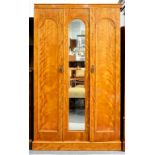 A VICTORIAN BIRCH WARDROBE, FITTED WITH A MIRROR, PANELLED DOORS WITH ARCHED TOP, 197 X 117CM