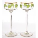 A PAIR OF THERESIENTHAL JUGENDSTIL ENAMELLED WINE GLASSES, C1910, THE BOWL WITH TRAILING VINES, GILT