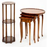 A VICTORIAN MAHOGANY OCTAGONAL TORCHERE AND A WALNUT NEST OF TABLES