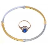 A 9CT GOLD BANGLE AND A GEM SET RING IN GOLD, MARKED 9CT, 7.7G, SIZE E++BANGLE IN GOOD CONDITION,