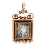 A GOLD LOCKET WITH A MINIATURE PORTRAIT OF THE RUSSIAN ICON OF THE MOTHER OF GOD, GLAZED REVERSE,