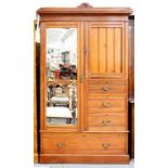 A VICTORIAN WALNUT COMPACTUM WITH MIRRORED DOOR, FITTED WITH ONE LONG AND THREE SHORT DRAWERS, EARLY