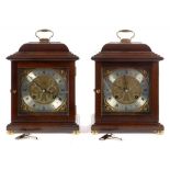 TWO SIMILAR REPRODUCTION BASKET TOPPED MAHOGANY MANTEL CLOCKS WITH BELL STRIKING MOVEMENT, THE BRASS