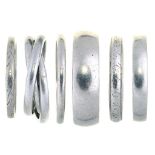 FIVE PLATINUM WEDDING RINGS, THREE MARKED PLAT, AND A PLATINUM TRIPLE RING, 35.3G, SIZES J, L, N,