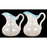 TWO SIMILAR VENETIAN LATTICINO GLASS JUGS OF BALUSTER SHAPE WITH TURQUOISE CABLE RIM, 12 AND 13CM H,